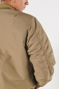 Chaqueta unicolor bomber acolchada con acabados en rib