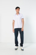 Camiseta unicolor polo con tejido en puños y cuello
