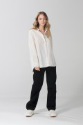Blusa manga larga a rayas unicolor oversize con bolsillo