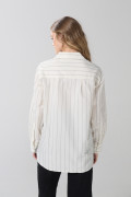 Blusa manga larga a rayas unicolor oversize con bolsillo