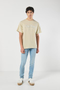 Jean tiro bajo skinny azul claro ceñido con desgastes