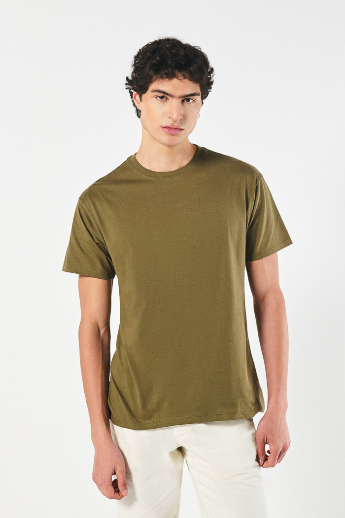 Camiseta cuello redondo unicolor holgada en algodón