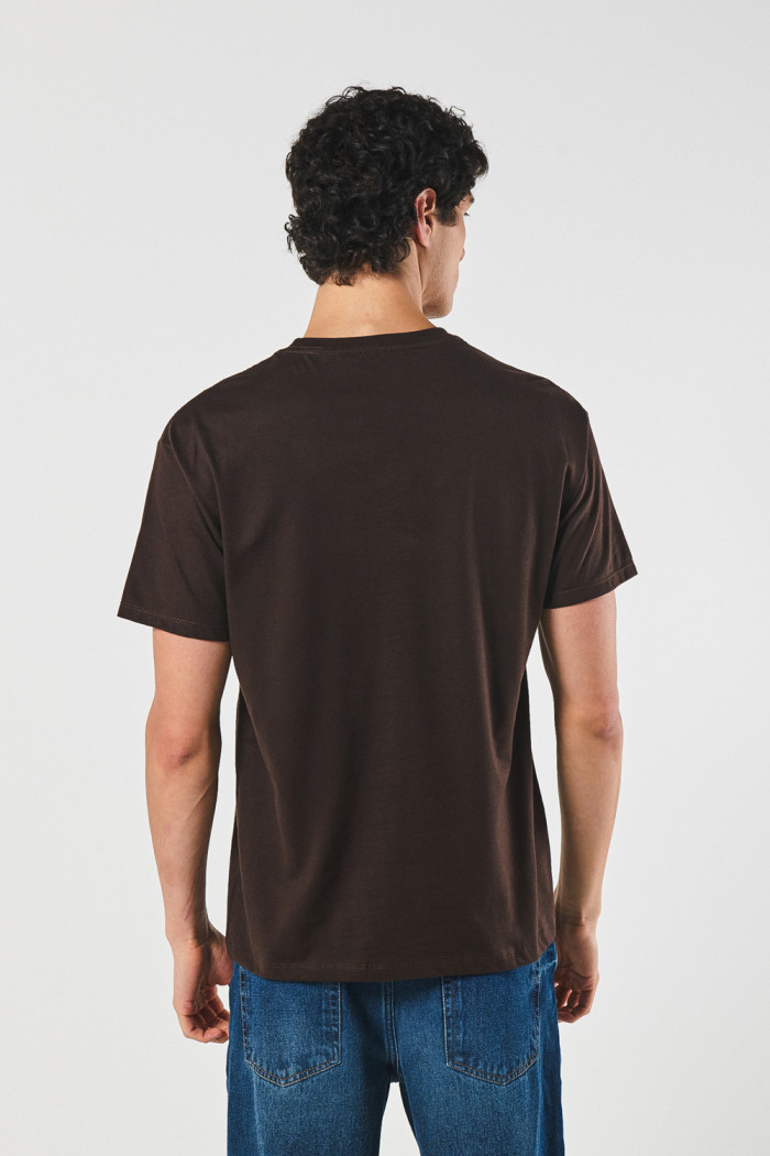 Camiseta cuello redondo unicolor holgada en algodón