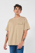 Camiseta unicolor oversize con bolsillo y manga corta