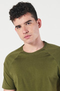 Camiseta en algodón unicolor con manga ranglan corta