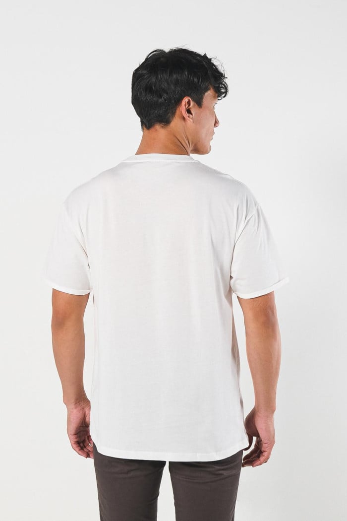 Camiseta unicolor manga corta con costura decorativa