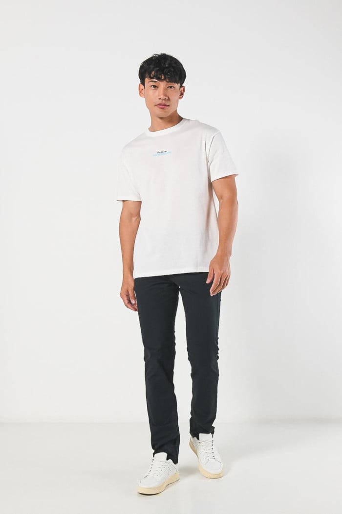 Camiseta unicolor en algodón manga corta con diseños urbanos