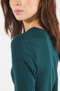 Camiseta unicolor ajustada con manga larga y cuello redondo
