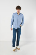 Camisa cuello nerú unicolor con botones y manga larga