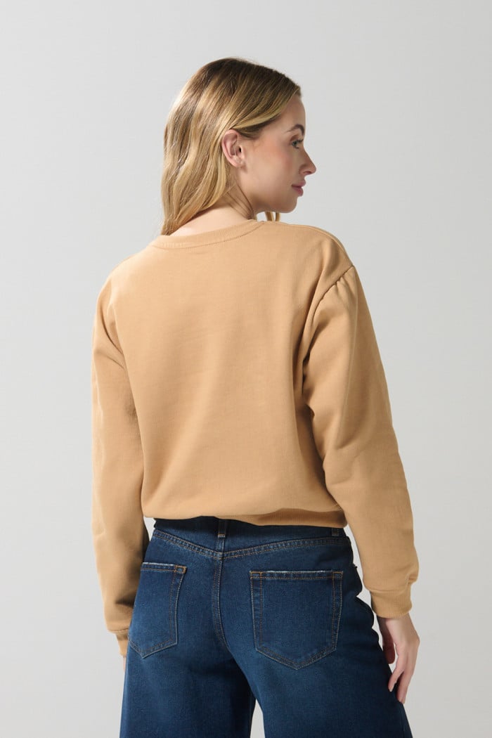 Buzo cuello redondo para mujer, con estampado en frente de Tom & Jerry.