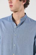 Camisa cuello nerú unicolor con botones y manga larga