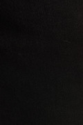 Jean súper skinny ajustado negro con cremallera y tiro bajo