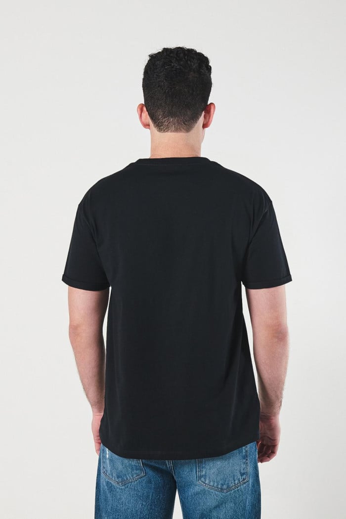 Camiseta en algodón manga corta unicolor para hombre, doblez en mangas y pespunte en frente.