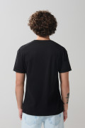 Camiseta en algodón unicolor con manga corta y costura