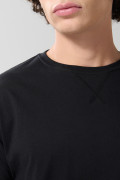 Camiseta en algodón unicolor con manga corta y costura