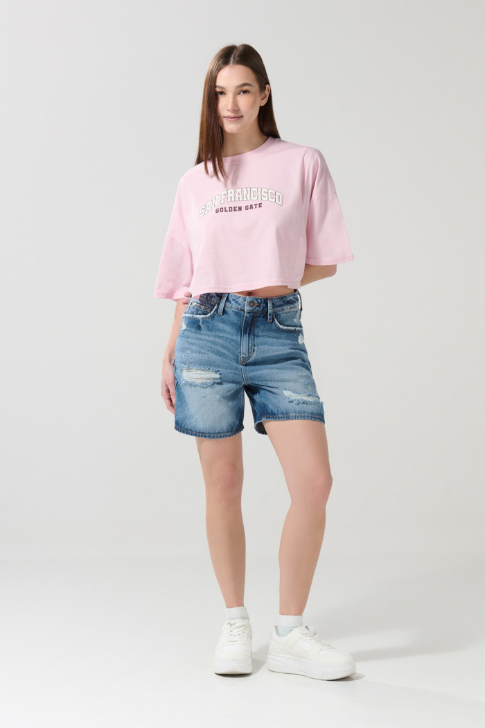 Short en jean azul con rotos y tiro súper alto