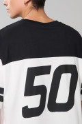 Camiseta crema oversize de Snoopy con manga corta