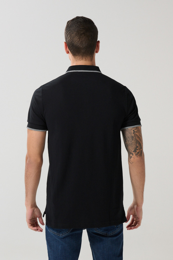 Camiseta Polo unicolor con cuello y puños tejido
