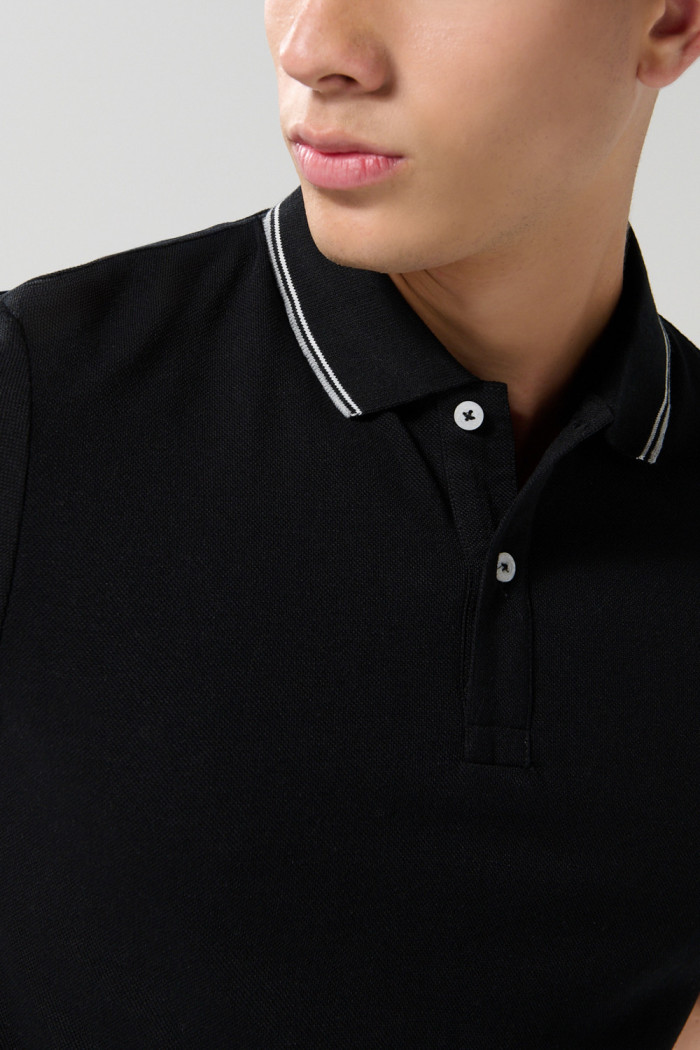 Camiseta Polo unicolor con cuello y puños tejido