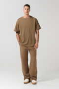 Camiseta unicolor cuello redondo oversize con hombro caído