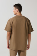 Camiseta unicolor cuello redondo oversize con hombro caído