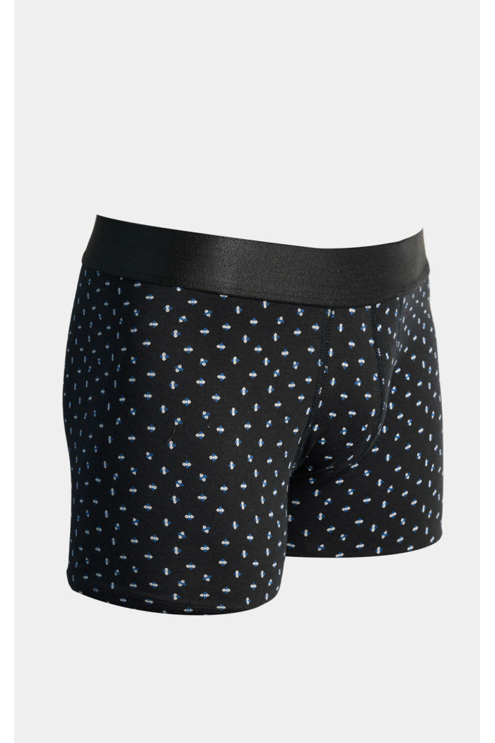 Bóxer azul intenso brief-medio con figuras continuas
