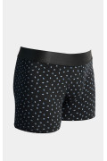 Bóxer azul intenso brief-medio con figuras continuas