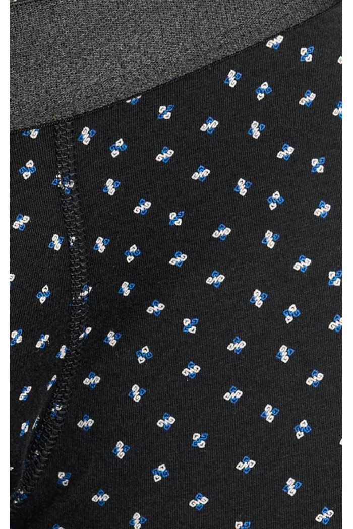 Bóxer azul intenso brief-medio con figuras continuas
