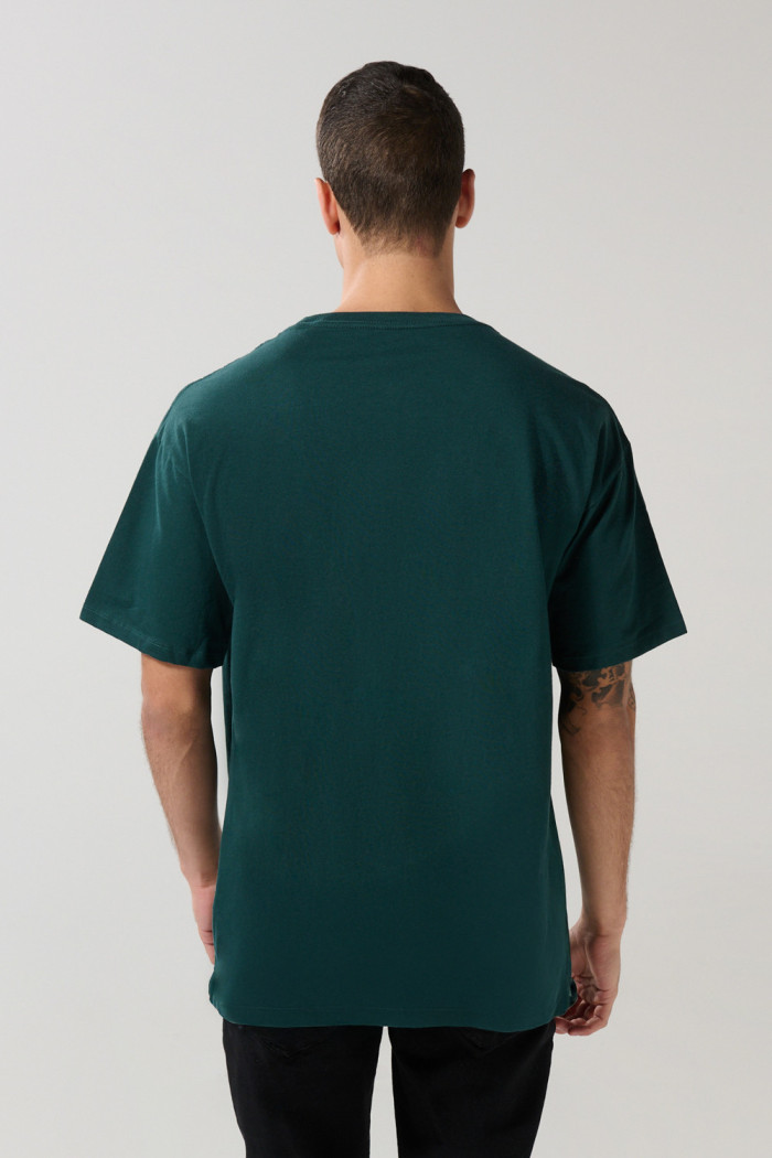 Camiseta oversize verde cuello redondo de Snoopy