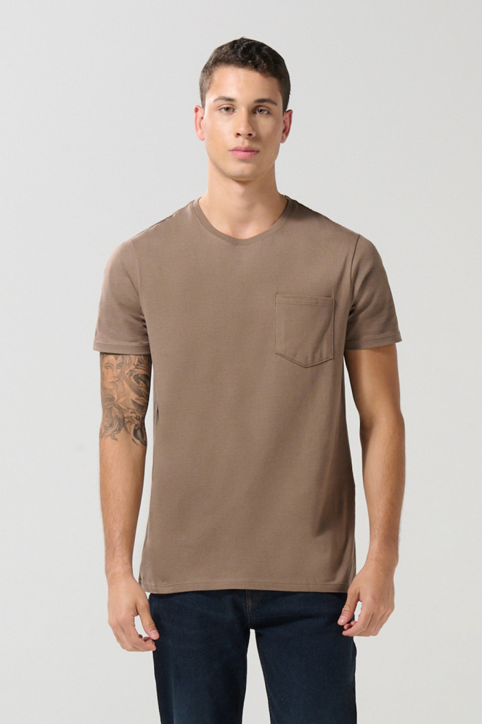 Camiseta en algodón manga corta unicolor con bolsillo