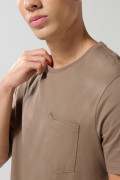 Camiseta en algodón manga corta unicolor con bolsillo