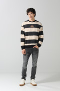 Jean skinny gris oscuro tiro bajo con ligeros desgastes