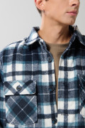 Chaqueta unicolor en paño con cuello trucker y cuadros