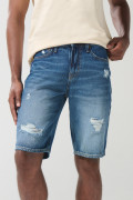 Bermuda en jean azul oscura slim con rotos y tiro bajo
