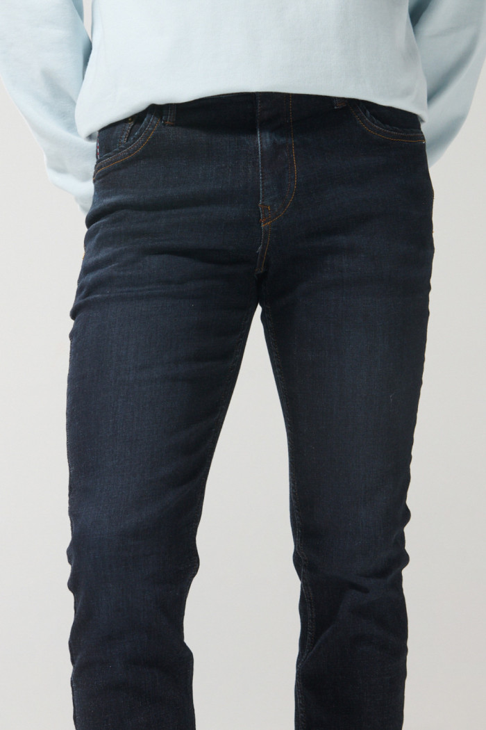 Jean azul intenso skinny con cremallera y tiro bajo
