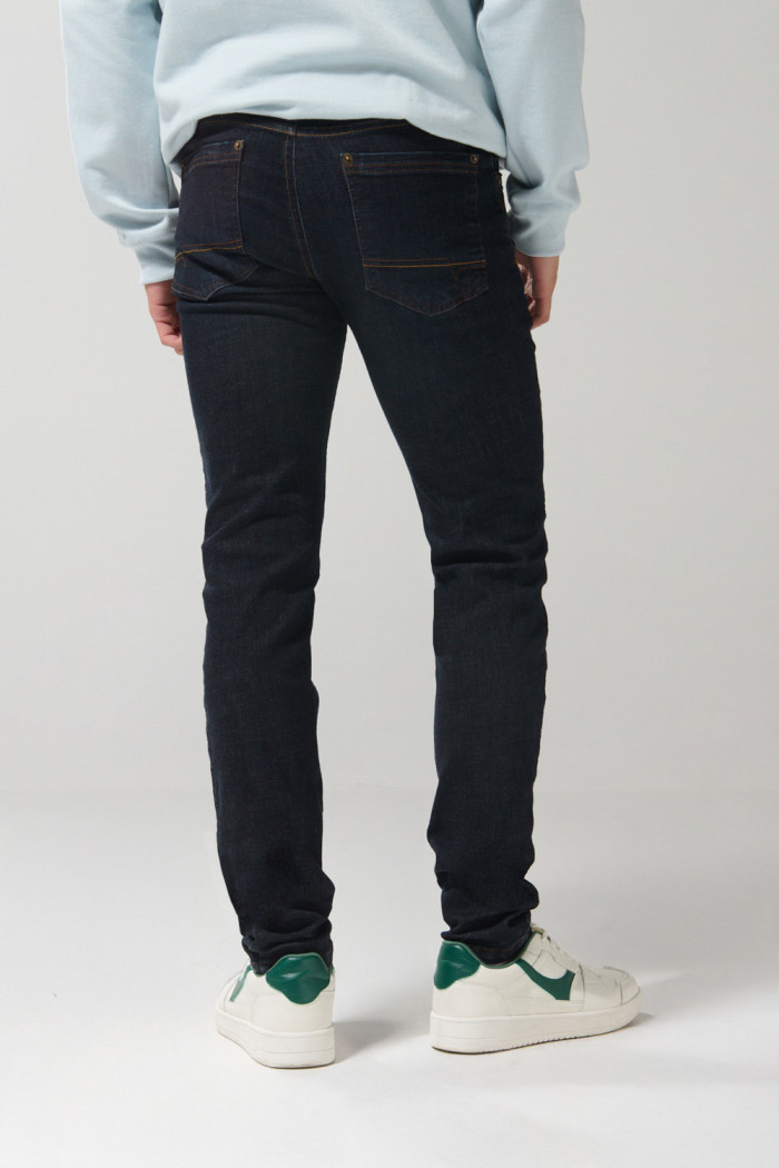 Jean azul intenso skinny con cremallera y tiro bajo