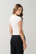 Camiseta crema de Los Picapiedra con cuello redondo