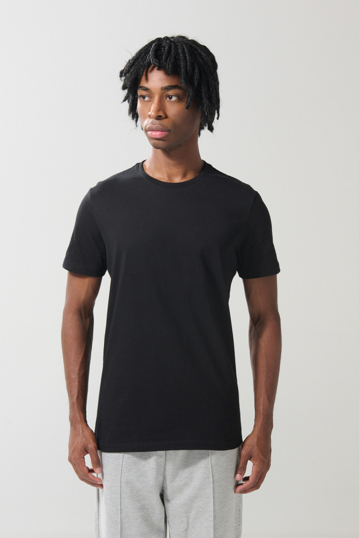 Camiseta en algodón unicolor con cuello redondo