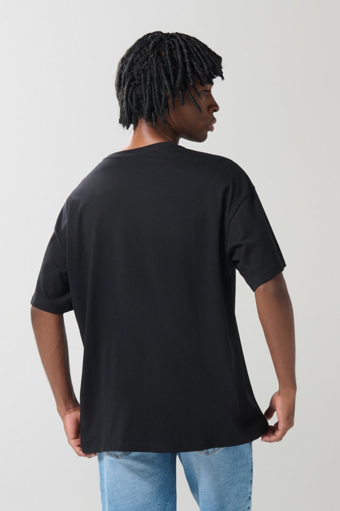 Camiseta negra oversize de Star Wars con cuello redondo