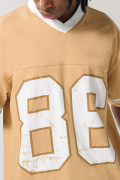 Camiseta oversize café clara college con cuello V