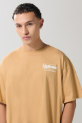 Camiseta oversize café clara manga corta con textos