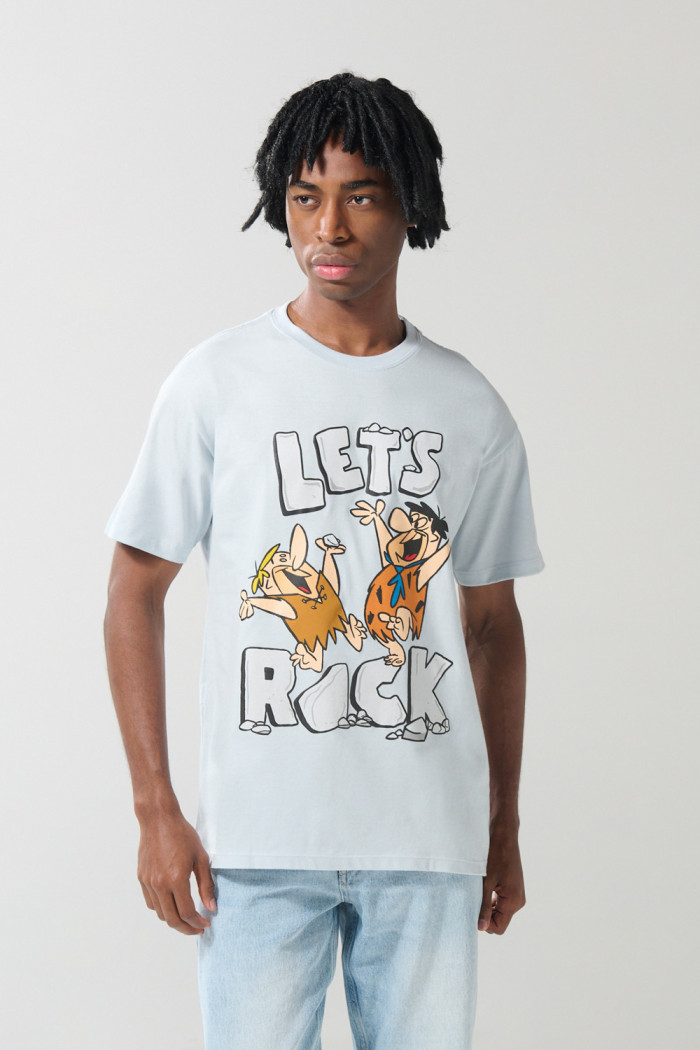 Camiseta azul manga corta con arte de Los Picapiedra
