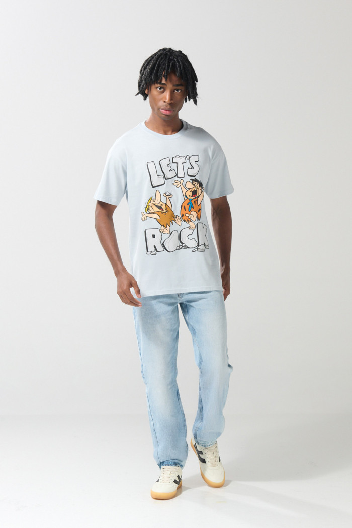 Camiseta azul manga corta con arte de Los Picapiedra
