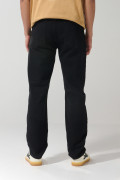 Jean slim ajustado negro con cremallera y tiro bajo