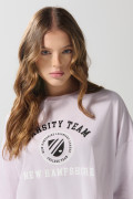 Camiseta oversize unicolor crop top con arte college