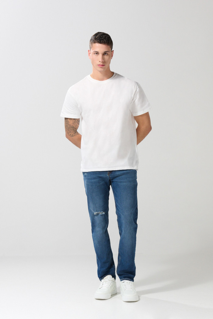 Jean slim tiro bajo azul oscuro con rotos en frente