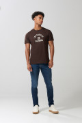 Jean skinny tiro bajo azul oscuro ajustado con bolsillos