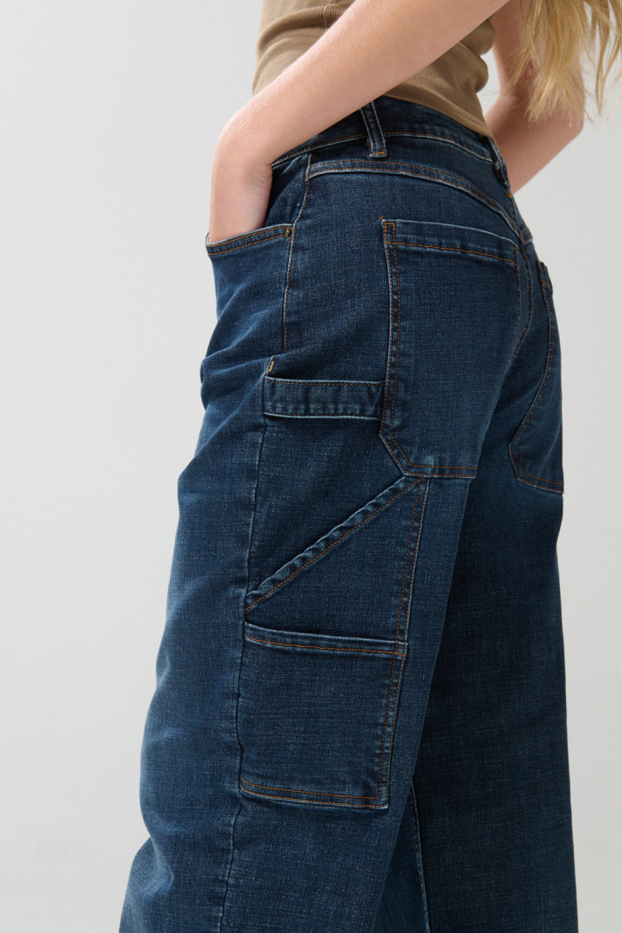 Jean tiro medio carpintero azul oscuro con bota ancha