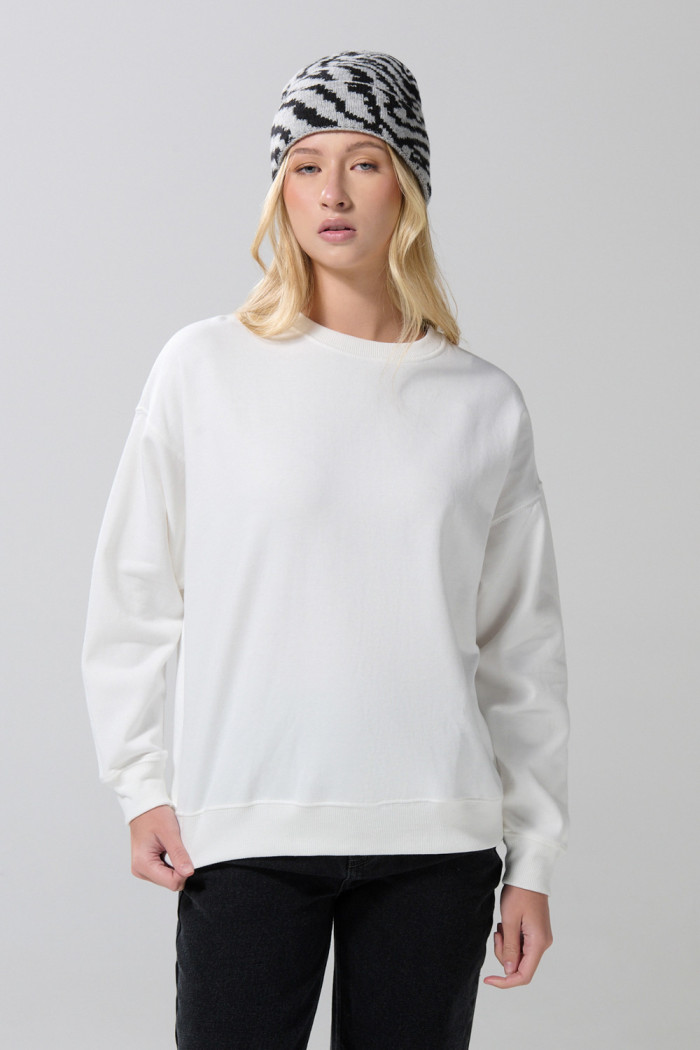 Buzo cuello redondo oversize con manga larga unicolor