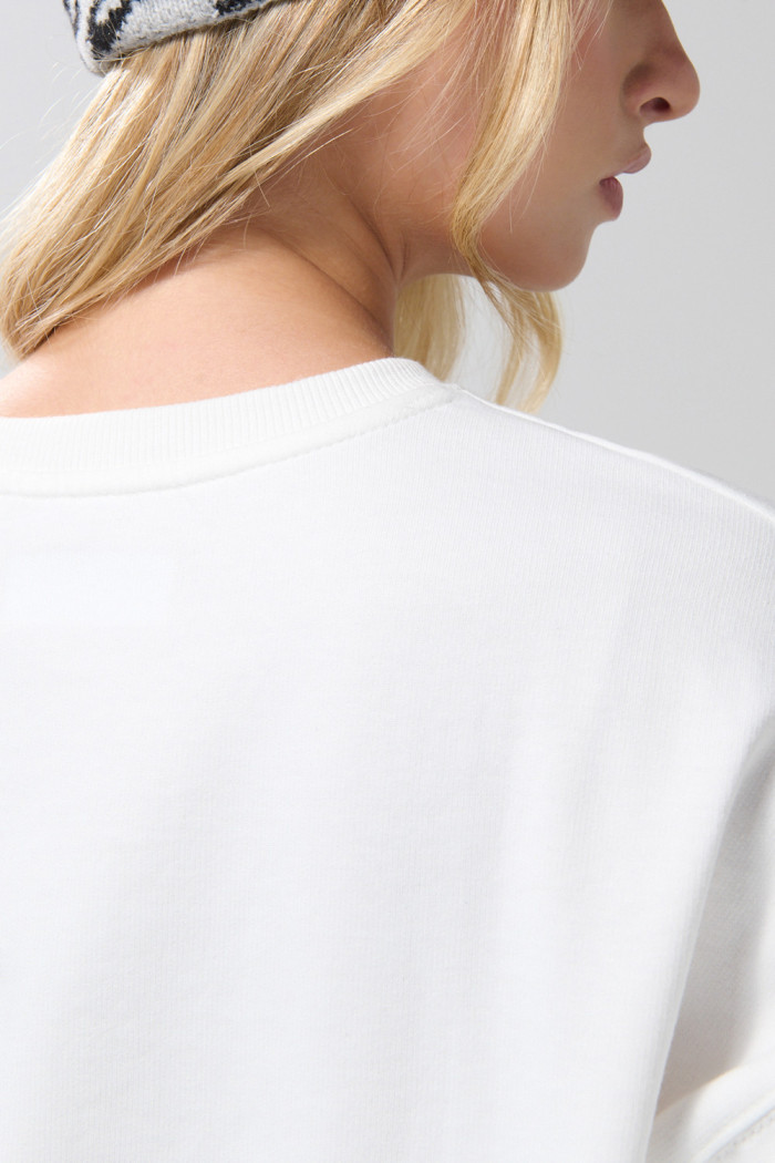 Buzo cuello redondo oversize con manga larga unicolor